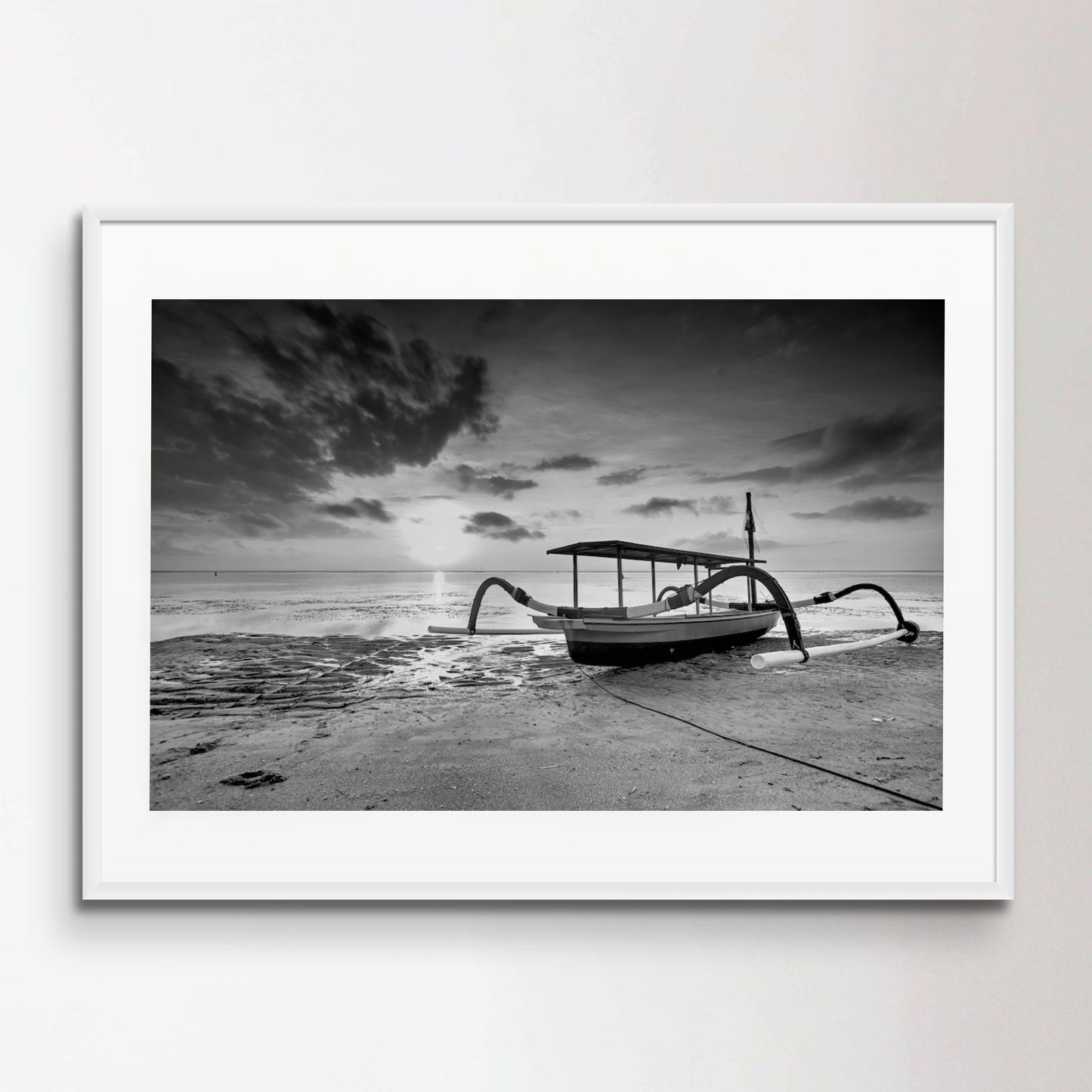 Boat Moored On Beach Against Sky During Sunset