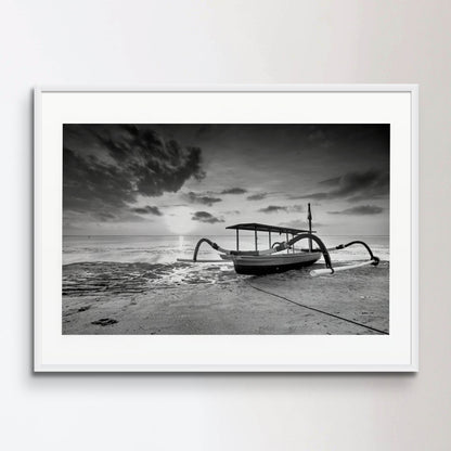 Boat Moored On Beach Against Sky During Sunset