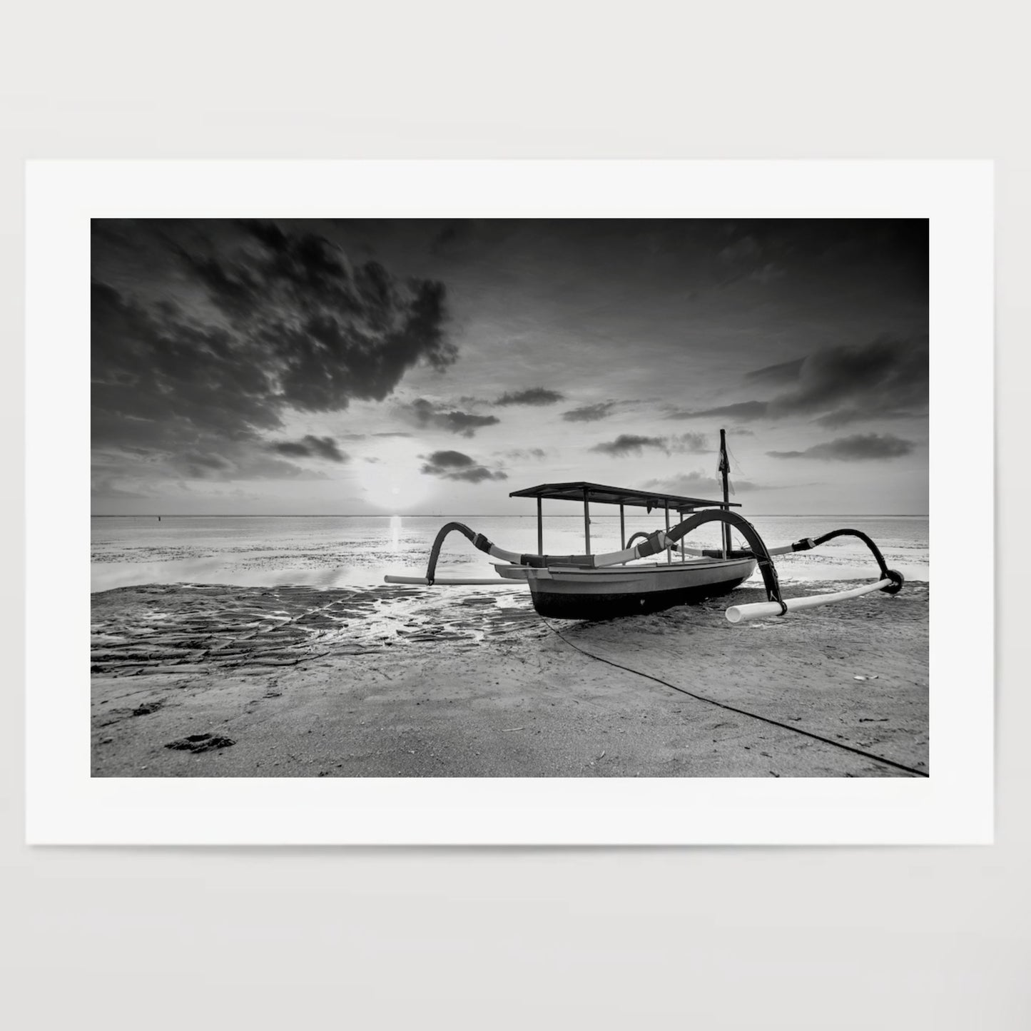 Boat Moored On Beach Against Sky During Sunset