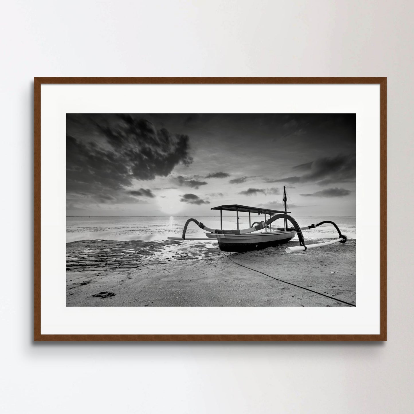 Boat Moored On Beach Against Sky During Sunset