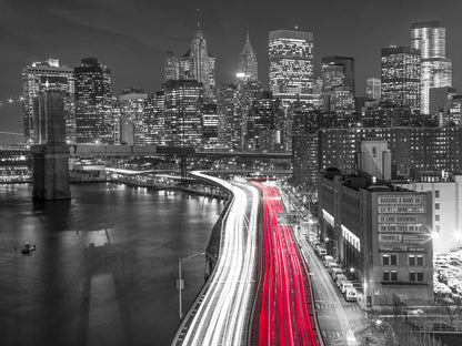 Strip lights on streets of Manhattan by east river, New York